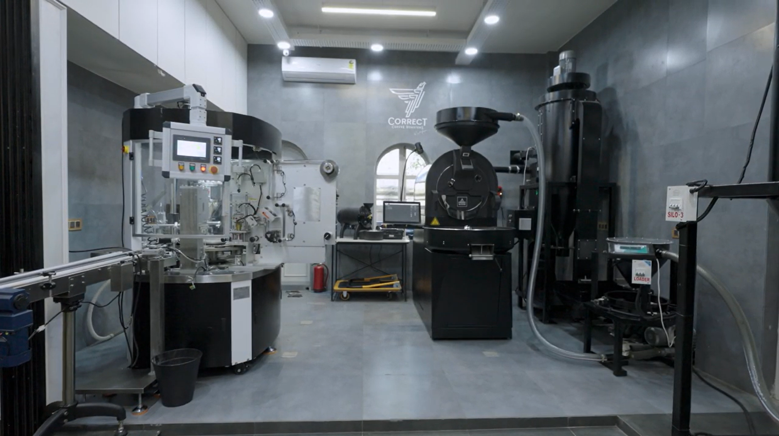 Contract coffee roasting floor with a roaster, packing line and silos